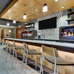 A bar at one of Drury's Kitchen + Bars, click to view the Kitchen + Bar menu available at all applicable locations