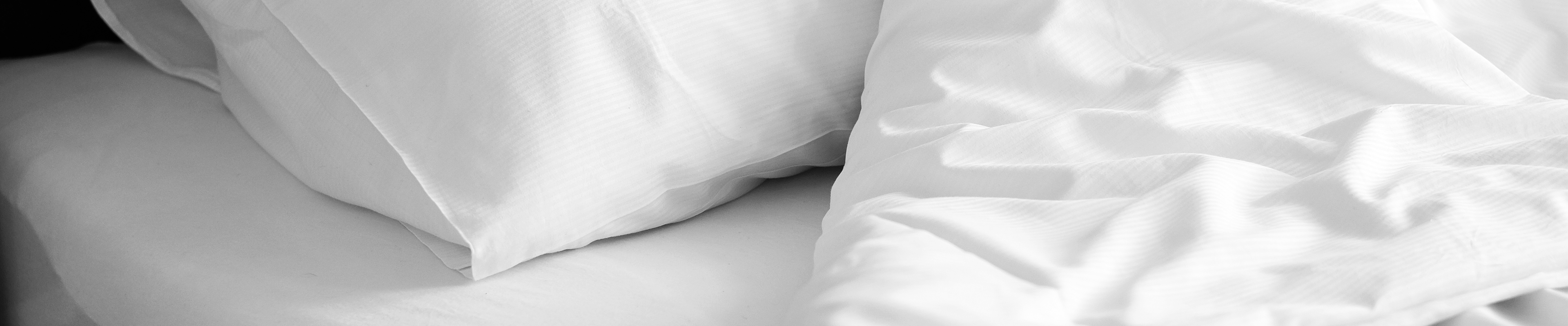 Hotel pillow and sheets. 