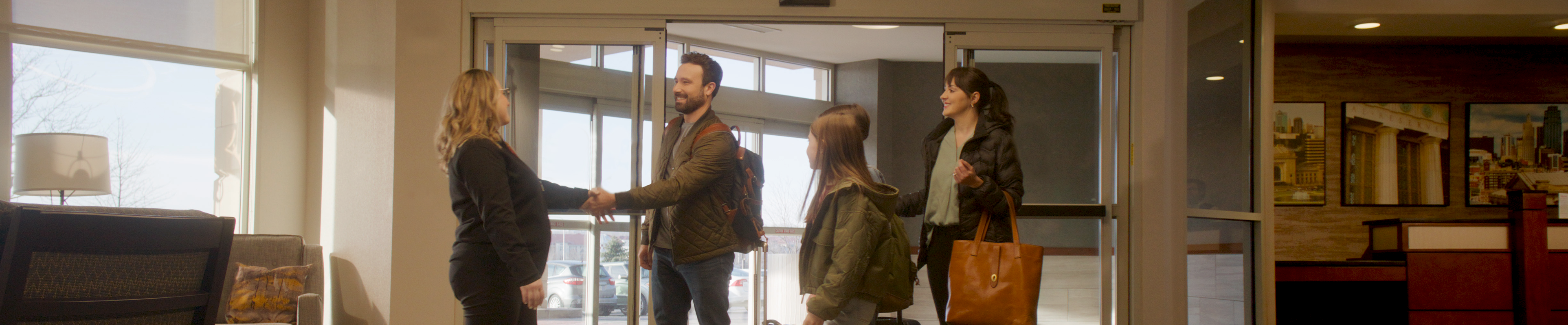 Drury Hotels Guests Walking into Hotel